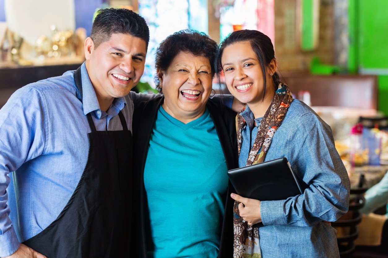 Happy family running a business together, planning buyout