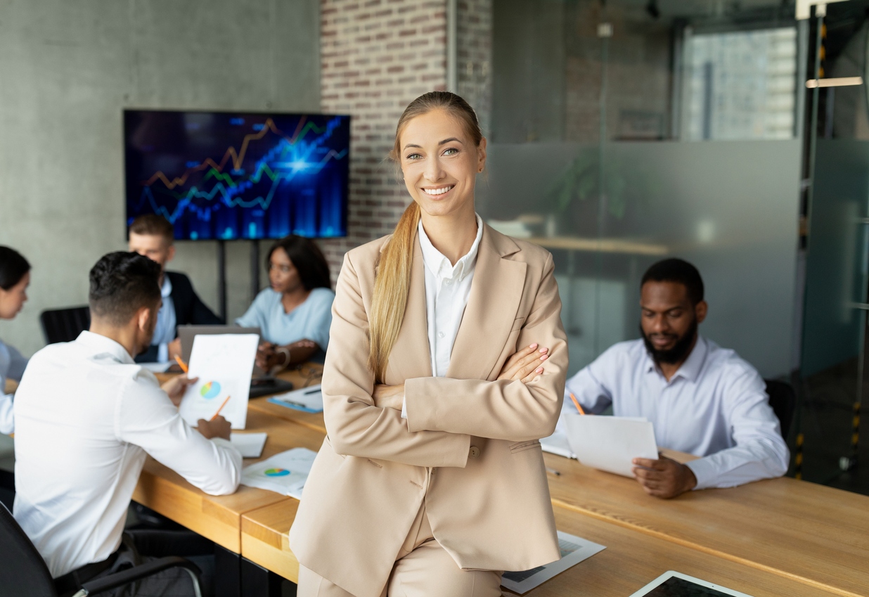 Confident businesswoman enhancing stakeholder value through business valuation during a meeting